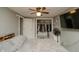 Charming bedroom featuring a ceiling fan, spacious closet, and a modern TV at 2658 S Rybolt Ave, Indianapolis, IN 46241