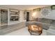 The expansive living room features an oversized couch, stylish lighting, and decorative wall art at 2658 S Rybolt Ave, Indianapolis, IN 46241