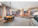 Spacious basement area with bar, pool table, exercise area, and staircase at 2733 Foxborough Dr, Greenwood, IN 46143