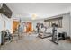 Spacious basement with a ceiling fan, a carpeted floor, weights and excercise equipment at 2733 Foxborough Dr, Greenwood, IN 46143
