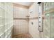Modern bathroom featuring glass block shower and updated shower head at 2733 Foxborough Dr, Greenwood, IN 46143