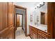 Bathroom vanity with a mirror, a towel rack, and an open doorway to the toilet room at 2733 Foxborough Dr, Greenwood, IN 46143