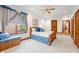 Light-filled bedroom with a window and a unique built-in window seat, complete with plush cushions at 2733 Foxborough Dr, Greenwood, IN 46143