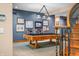 Game room with pool table, gallery wall, spiral staircase at 2733 Foxborough Dr, Greenwood, IN 46143