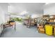 Spacious garage with shelving, workbench and open garage door at 2733 Foxborough Dr, Greenwood, IN 46143
