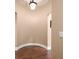 Hallway with curved wall detail and hardwood floors at 2733 Foxborough Dr, Greenwood, IN 46143