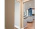 Open doorway to a kitchen with center island, granite counters, stainless appliances, and hardwood floors at 2733 Foxborough Dr, Greenwood, IN 46143