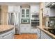 Kitchen featuring gray cabinets, stainless steel appliances, and granite countertops at 2733 Foxborough Dr, Greenwood, IN 46143