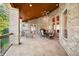 Expansive covered patio with a wood ceiling, perfect for outdoor dining and lounging with a serene view at 2733 Foxborough Dr, Greenwood, IN 46143