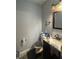 Functional bathroom featuring a vanity with modern fixtures and practical storage solutions at 3008 N Michigan Rd, Shelbyville, IN 46176