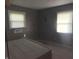 Bedroom with two windows and Star Wars themed wall decals at 3008 N Michigan Rd, Shelbyville, IN 46176