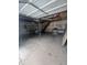 Unfinished garage space with a second story and ample room for two cars at 3008 N Michigan Rd, Shelbyville, IN 46176
