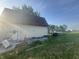 Side exterior with miscellaneous items in the yard at 3008 N Michigan Rd, Shelbyville, IN 46176