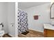 A full bathroom with a shower, toilet and vanity at 301 S B St, Thorntown, IN 46071