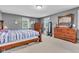 Bedroom with natural light and wooden furniture at 301 S B St, Thorntown, IN 46071