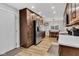 A charming kitchen featuring wooden cabinets, stainless steel appliances, and durable flooring at 301 S B St, Thorntown, IN 46071