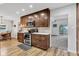 A well-equipped kitchen featuring sleek countertops, stainless steel appliances, and wooden cabinets at 301 S B St, Thorntown, IN 46071