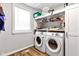 A conveniently placed laundry room with side by side washer and dryer at 301 S B St, Thorntown, IN 46071