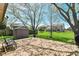 A spacious backyard features a well-kept lawn, wooden deck, and a storage shed, providing an inviting outdoor space at 3027 Ash Way, Lapel, IN 46051