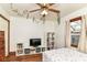 Bright bedroom with wood floors, white walls, and shelving at 3027 Ash Way, Lapel, IN 46051