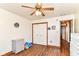 Bedroom featuring a ceiling fan, closet, and toys at 3027 Ash Way, Lapel, IN 46051