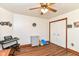 Bedroom featuring a ceiling fan, closet, and toys at 3027 Ash Way, Lapel, IN 46051