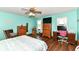 Charming bedroom with wood floors, a ceiling fan, and two large dressers at 3027 Ash Way, Lapel, IN 46051