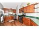 Bright kitchen featuring stainless appliances, wood cabinets and ample counter space at 3027 Ash Way, Lapel, IN 46051