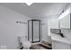 Stylishly updated bathroom with glass-enclosed shower and modern vanity at 3132 Indianapolis Ave, Indianapolis, IN 46208