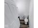 Cozy half-bath features new flooring and fixtures at 3132 Indianapolis Ave, Indianapolis, IN 46208