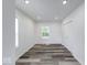 Bright bedroom with wood floors, a closet, and natural light at 3132 Indianapolis Ave, Indianapolis, IN 46208