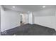 Spacious bedroom featuring soft gray carpet, fresh white walls, and a convenient ensuite access at 3132 Indianapolis Ave, Indianapolis, IN 46208