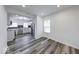 Open concept view of a well-lit kitchen featuring modern appliances and design at 3132 Indianapolis Ave, Indianapolis, IN 46208
