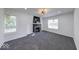 Bright, spacious living room featuring neutral walls, new carpet and lots of light at 3132 Indianapolis Ave, Indianapolis, IN 46208