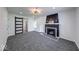 This spacious living room has new carpet and plenty of natural light at 3132 Indianapolis Ave, Indianapolis, IN 46208