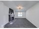 Spacious, brightly lit living room features stylish modern updates and fresh paint at 3132 Indianapolis Ave, Indianapolis, IN 46208
