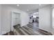 View showcasing the kitchen, utility room, and an open-concept living space at 3132 Indianapolis Ave, Indianapolis, IN 46208