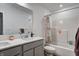 Bathroom with double sink vanity, mirror and bathtub with shower at 3148 Hawking Ct, Danville, IN 46122