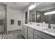 Stylish bathroom featuring double vanity, quartz countertop, and tiled walk-in shower at 3148 Hawking Ct, Danville, IN 46122
