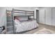 Charming bedroom features a cozy bunk bed with easy-access stairs and playful, decorative accents at 3148 Hawking Ct, Danville, IN 46122