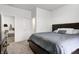 Cozy bedroom features a king bed with soft linens, with an ensuite bathroom and mud room entrance at 3148 Hawking Ct, Danville, IN 46122