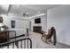 Bright, spacious main bedroom with tray ceiling, with a TV and rocking chair at 3148 Hawking Ct, Danville, IN 46122