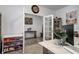 Bright office space with french doors, neutral walls, and wood-look floors for a comfortable work environment at 3148 Hawking Ct, Danville, IN 46122