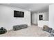Spacious playroom with TV and comfortable seating for relaxation and entertainment at 3148 Hawking Ct, Danville, IN 46122