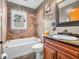 Cozy bathroom with tub, shower, and vanity showcasing modern fixtures and warm, neutral tones, creating a relaxing atmosphere at 389 E State Road 42, Mooresville, IN 46158