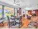 Dining room area featuring hardwood floors, table and chairs, and natural light at 389 E State Road 42, Mooresville, IN 46158