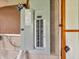 Image shows an electrical panel and access door in a basement or utility room with concrete block walls at 389 E State Road 42, Mooresville, IN 46158