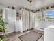 Functional laundry area with plenty of space and natural light at 389 E State Road 42, Mooresville, IN 46158