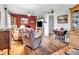 Inviting living room featuring hardwood floors, comfortable seating, and a cozy atmosphere at 389 E State Road 42, Mooresville, IN 46158