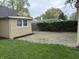 Lush backyard features a manicured lawn and gravel area, perfect for outdoor activities at 421 W 44Th St, Indianapolis, IN 46208